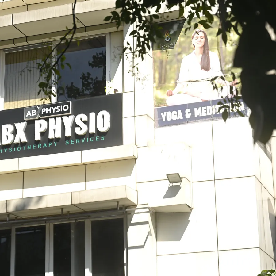 The ABX Physio clinic signage on Zoo Road, Guwahati